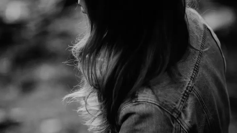 Working through my recovery has brought me to a place of knowing who I am and finding my identity in God and Christ instead of my husband. A woman praying.