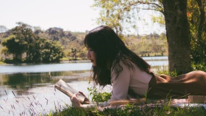 A woman reading a book.