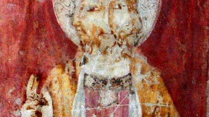 This 13th-century fresco in a church in Perugia, Italy, depicts the Trinity as a being with three faces representing Father, Son and Holy Spirit.