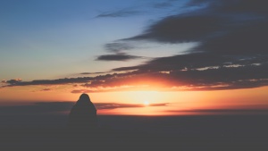 A person watching the sunset.