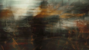 a blurry man in an abstract setting