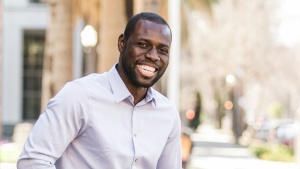 smiling man wearing white shirt