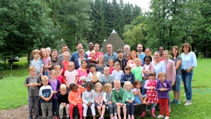 Campers and staff pose for a group photo at the German and Dutch camp in Germany. 