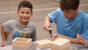 Campers working on a project. 