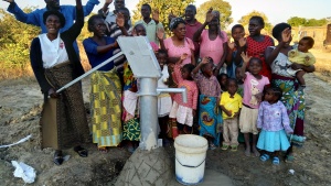 LifeNets recipients in Chipata elated over the new borehole to provide them with fresh water.