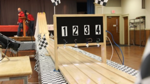 Photo of the racetrack used for the New England Pinewood Derby.