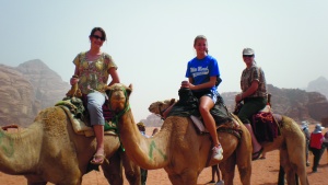 Wadi Rum in Jordan at the Feast of Tabernacles 2010. In this photo Stella is (at the right wearing a hat) riding a camel with friends Alyssa Diggins and Mary Miller. 