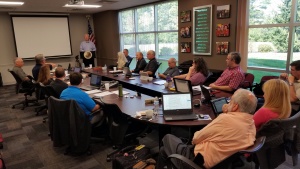 Director Steve Nutzman conducting camp directors' meeting.