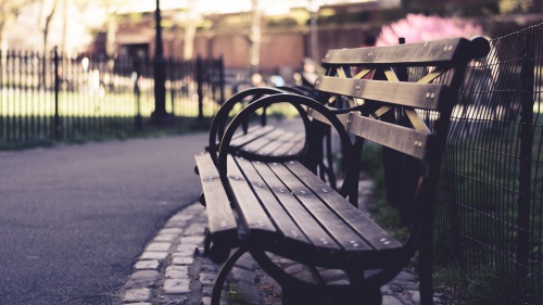 An empty park bench.