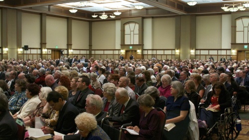 Church members listening to message delivered during the Feast.