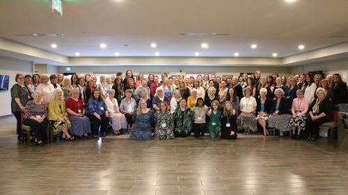 a group of ladies gathered for the enrichment weekend