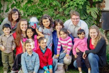 Children, volunteers, and Jelly at Eagle's Nest Orphanage