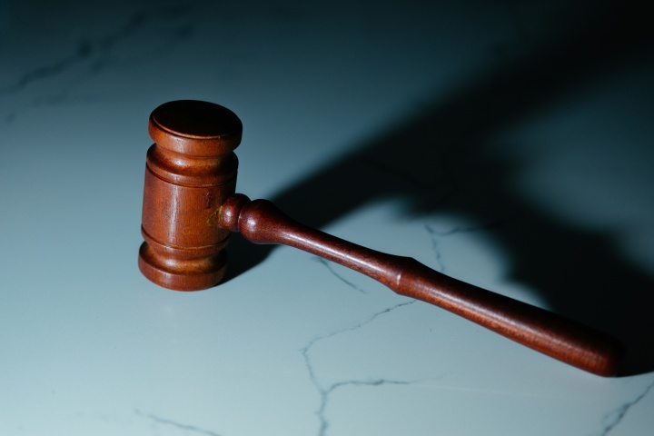 a gavel on a marble surface