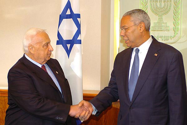 Colin Powell meets with Israeli Prime Minister Ariel Sharon. 