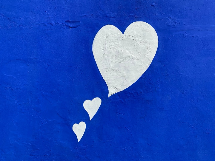 White Hearts on Blue Background