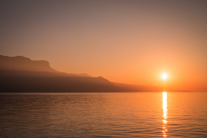 A sunset over a body of water.