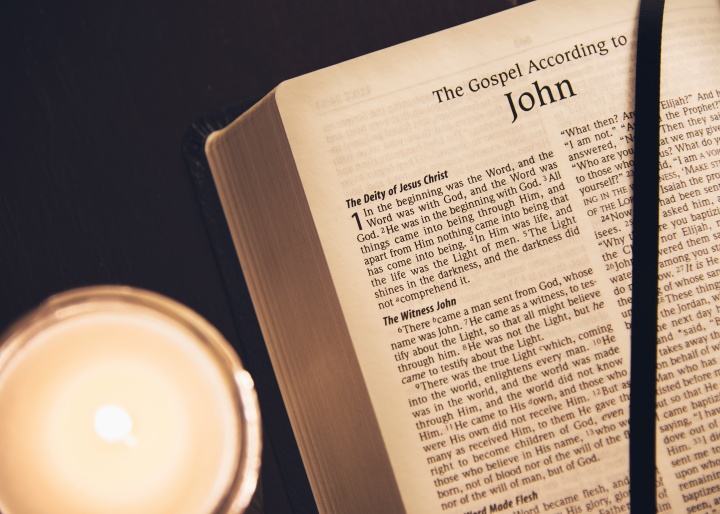 A Bible opened to the book John.