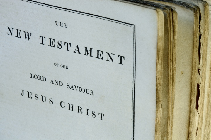 A Bible opened to the beginning of the New Testament.