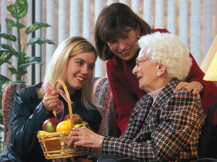 Spending time with a older lady in wheelchair.