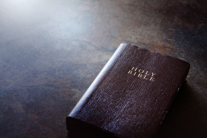 A Bible on a table.