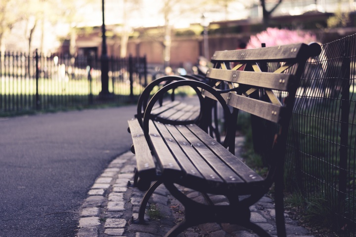 An empty park bench.