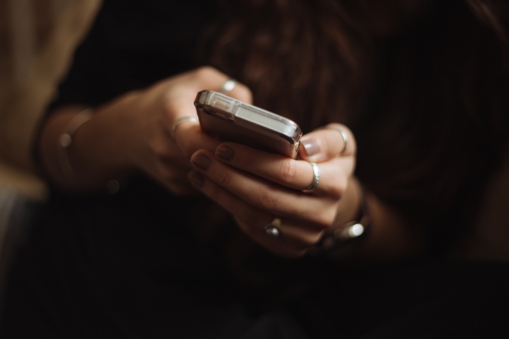 A woman using a smartphone.