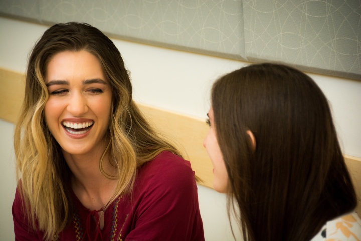 Two woman talking to each other.