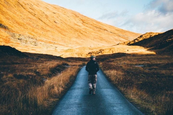 A man walking on a path.