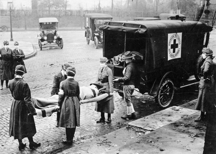 Nurses transport a Spanish flu victim in 1918.