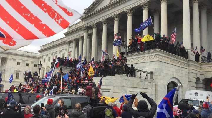 People gathering outside the Capitol building in Washington, DC.