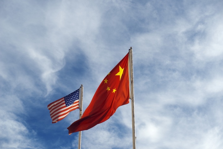 A United States of America and Chinese flag.