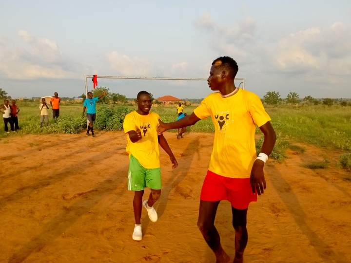 teenagers playing outdoor sports