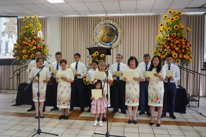 a choir singing while wearing coordinating clothes