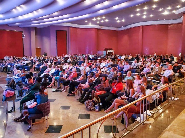 a group of brethren seated in an auditorium