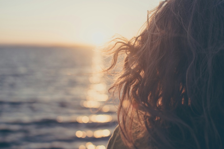 A woman looking out on the ocean.