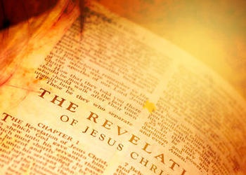 Bible opened to the book of Revelation.