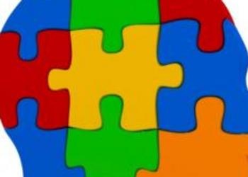 Multi-colored jigsaw puzzle pieces that make shape of human head - Just For Yout