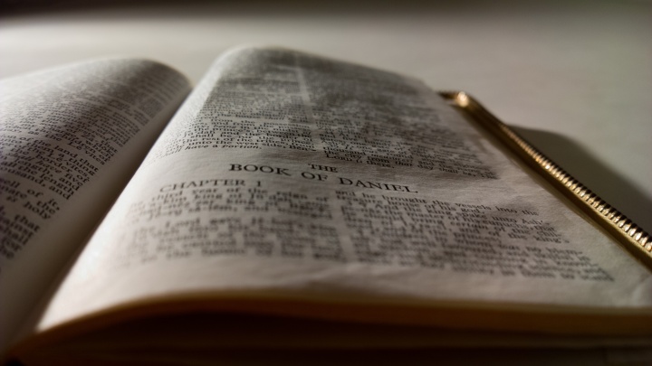 A Bible opened the first chapter of the book of Daniel.