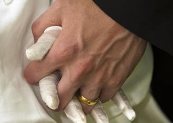 bride and groom hand in hand