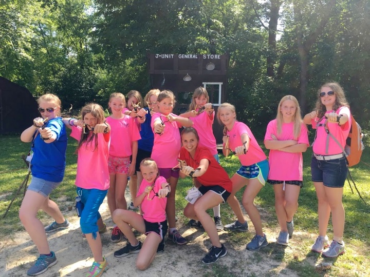 Campers and staff enjoying activities at preteen Camp Ironwood. 
