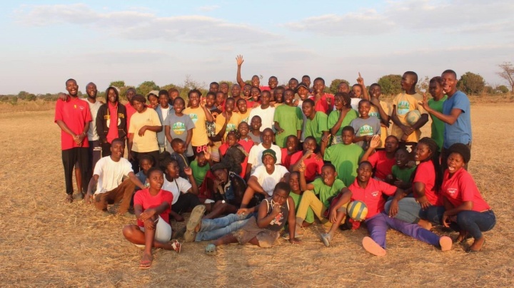 Campers and staff mile for a photo at UYC's camp in Malawi.