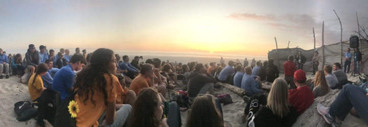 Campers and staff during campfire time at Northwest.