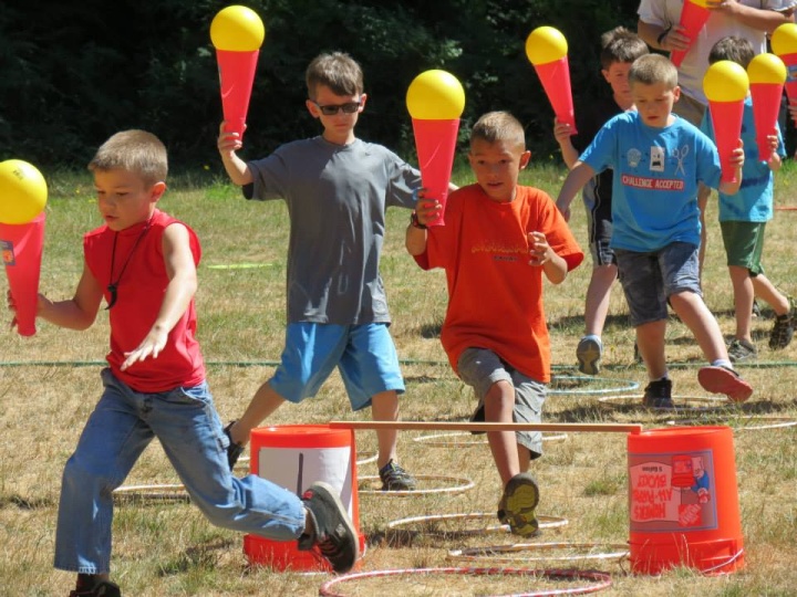 Campers enjoying novelty olympic games. 