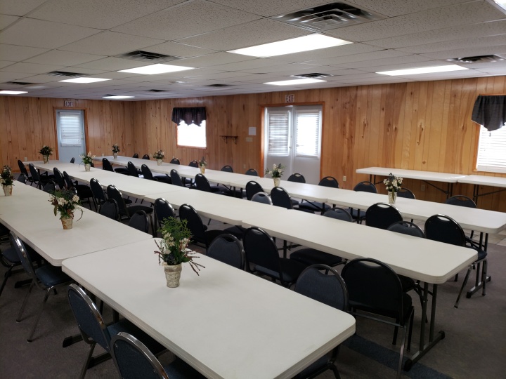  The hall is set up for a potluck. 