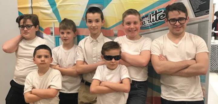 Boys from New England dress as greasers for the dance social on Feb. 1.