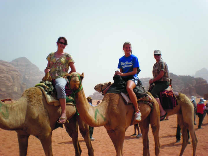 Wadi Rum in Jordan at the Feast of Tabernacles 2010. In this photo Stella is (at the right wearing a hat) riding a camel with friends Alyssa Diggins and Mary Miller. 