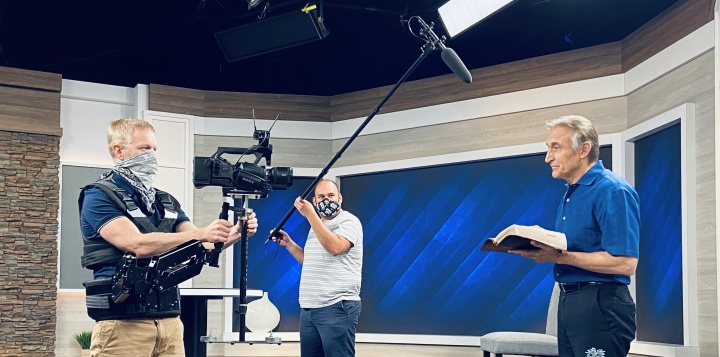 Beyond Today media staff wearing masks as they record Steve Myers presenting a BT Daily.