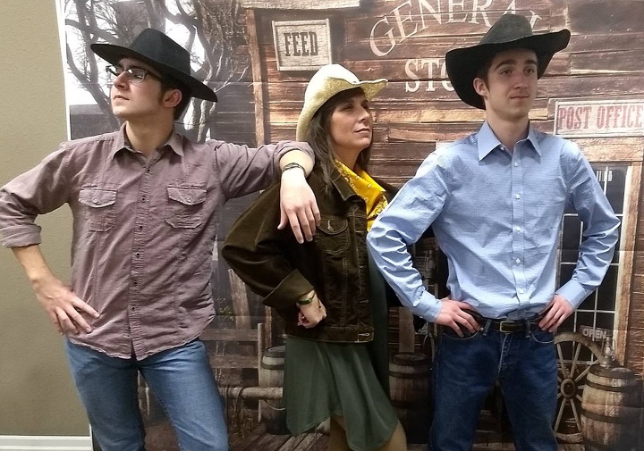Roundup Trio: Sherry Kenady and her sons Brad and Kurtis strike a playful pose at the Roundup.