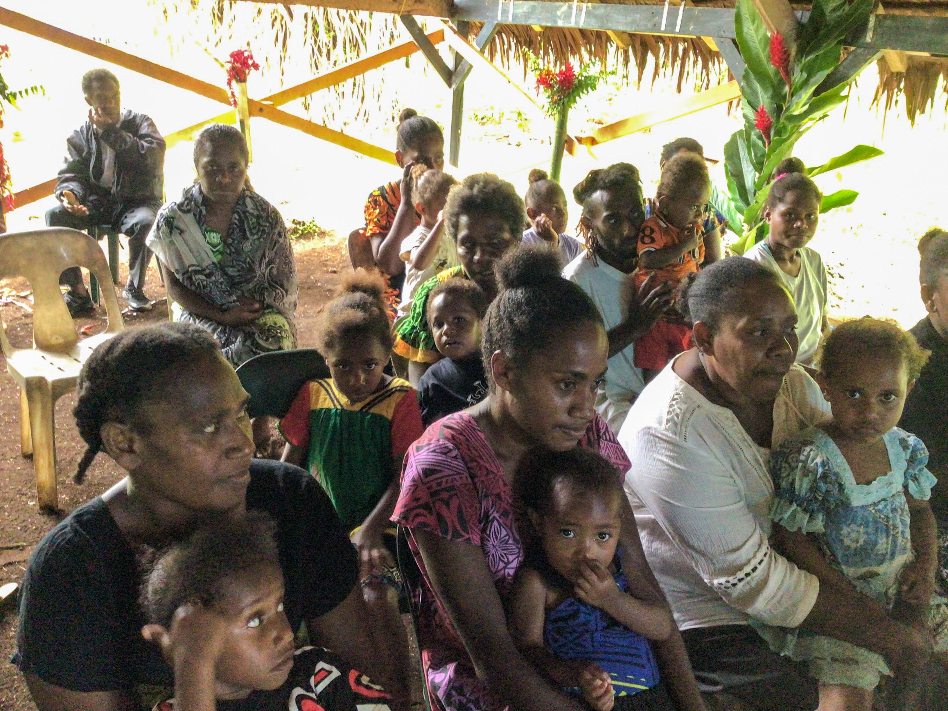 a group of parents and children