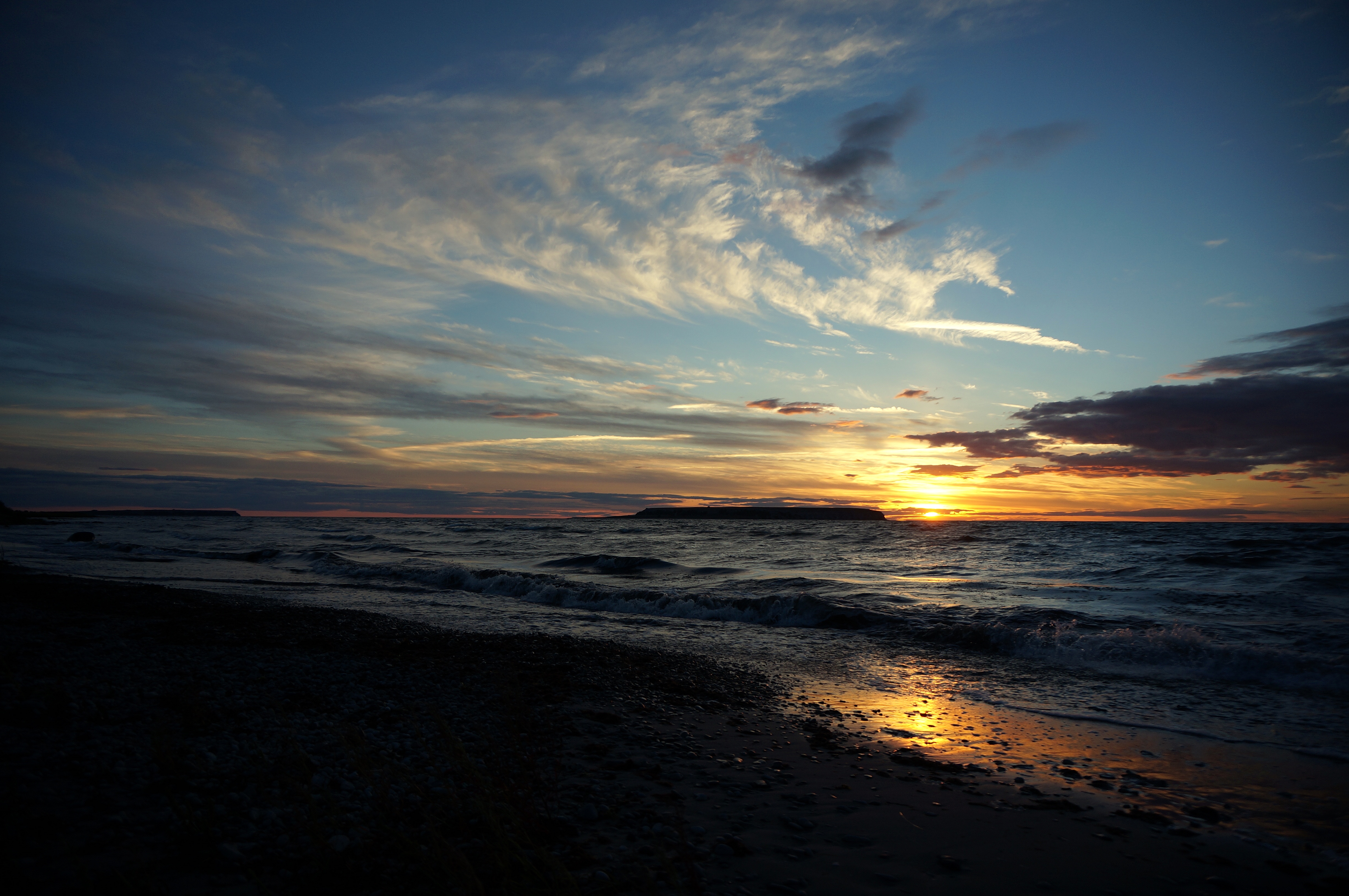 Sunset over an ocean.